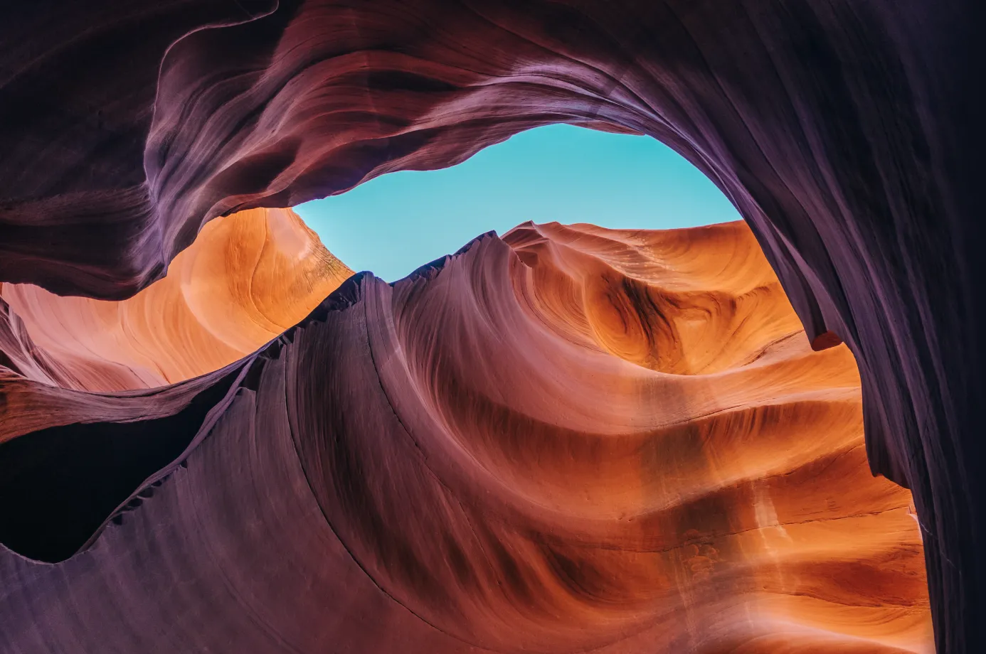 View from inside a dessert canyon into the sky.